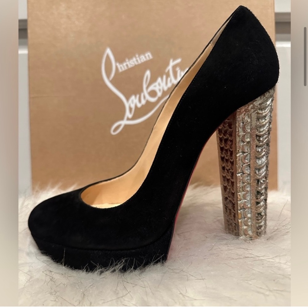 Christian Louboutin black suede pumps.